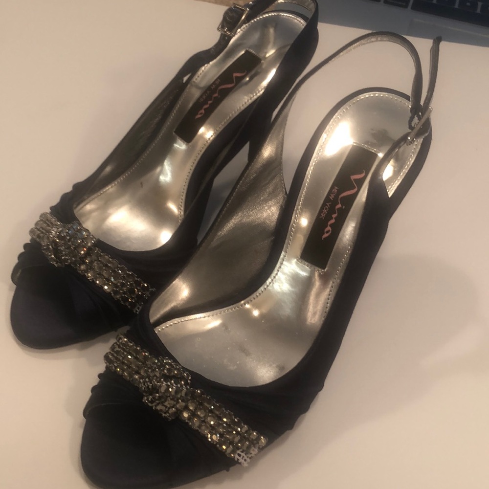 Navy satin and rhinestone peep toe dress shoes.